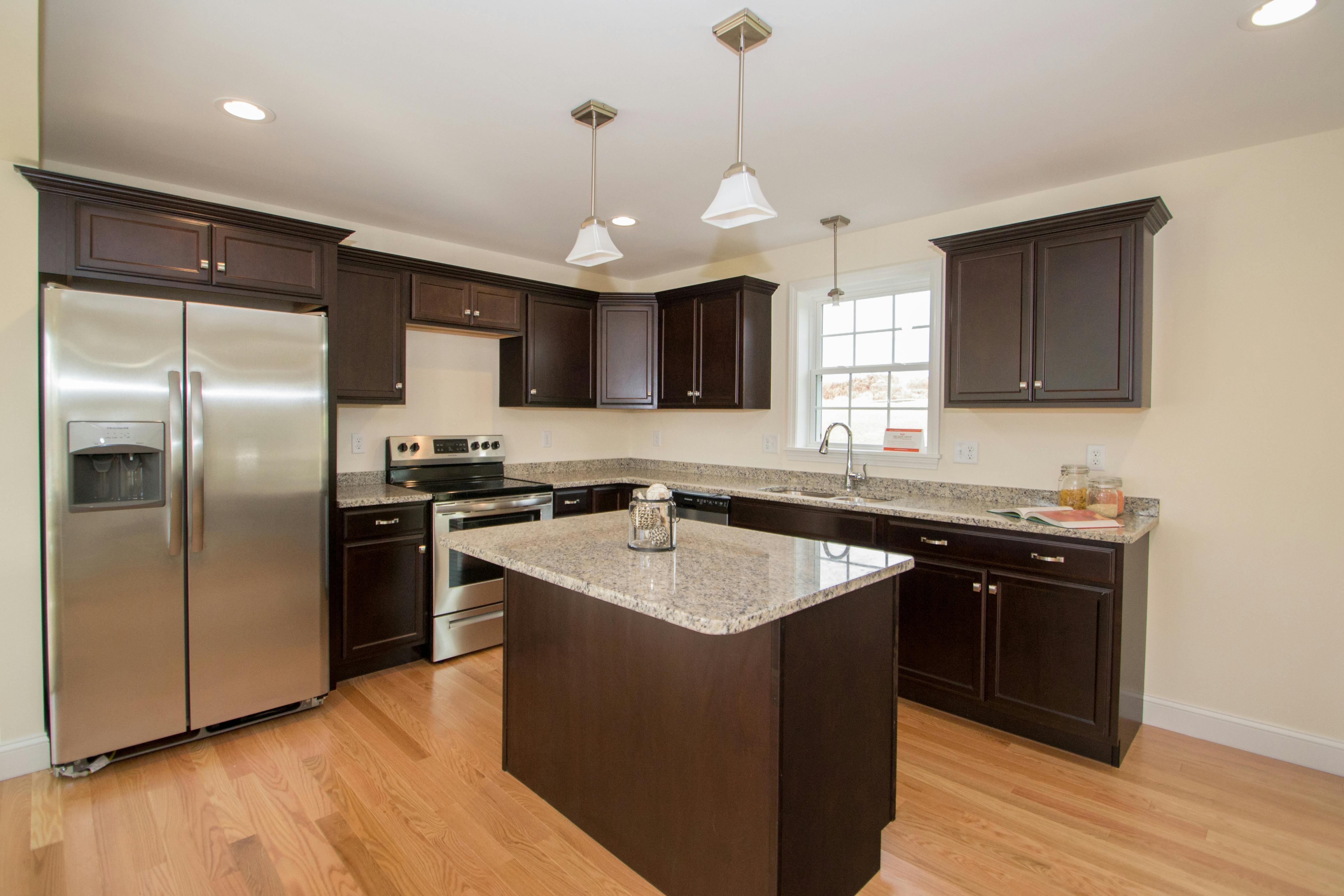 dark kitchen cabinets in new home